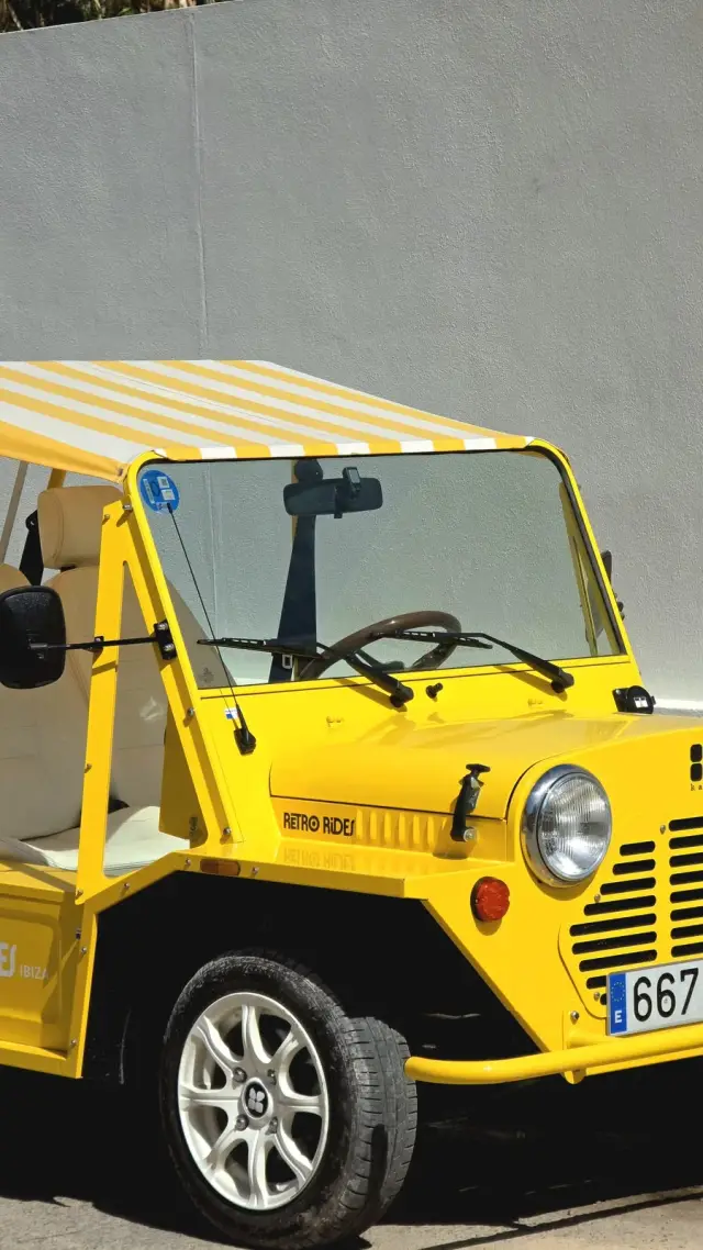Yellow Kate electric Moke with Retro Rides and Ibiza branding — Spanish plate, Playa d'en Bossa